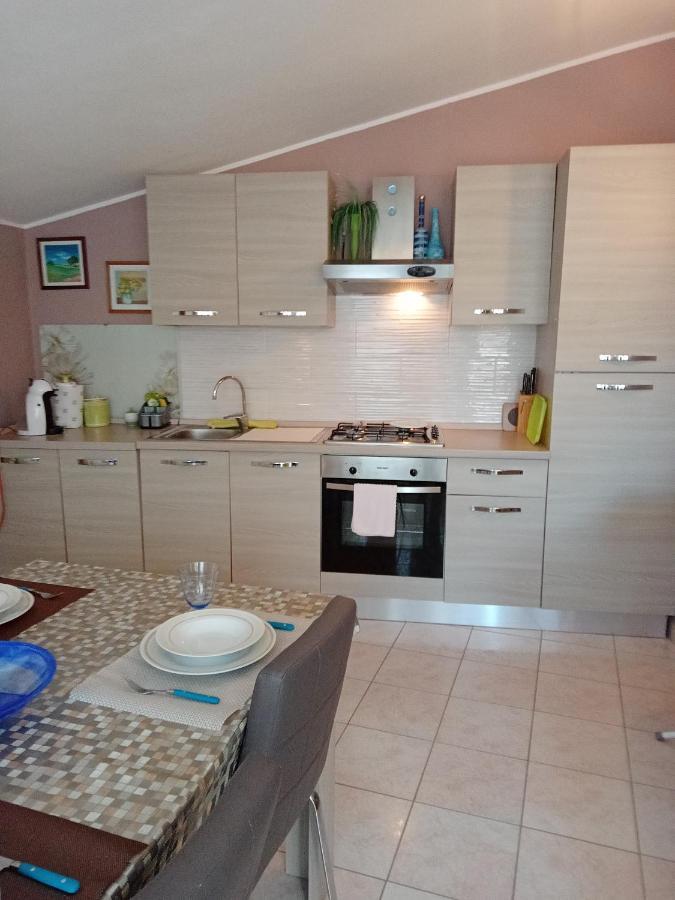 Casa Vacanza Le 2 Isole Suni Экстерьер фото